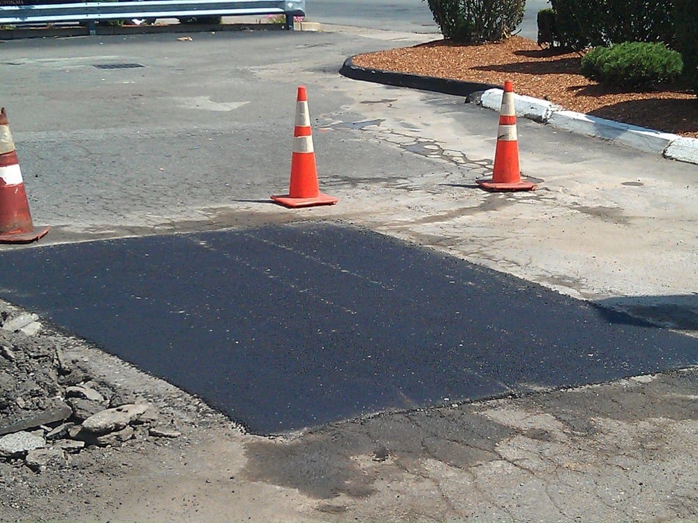 Pothole Crack Repair by Atlas Asphalt & Sealcoat
